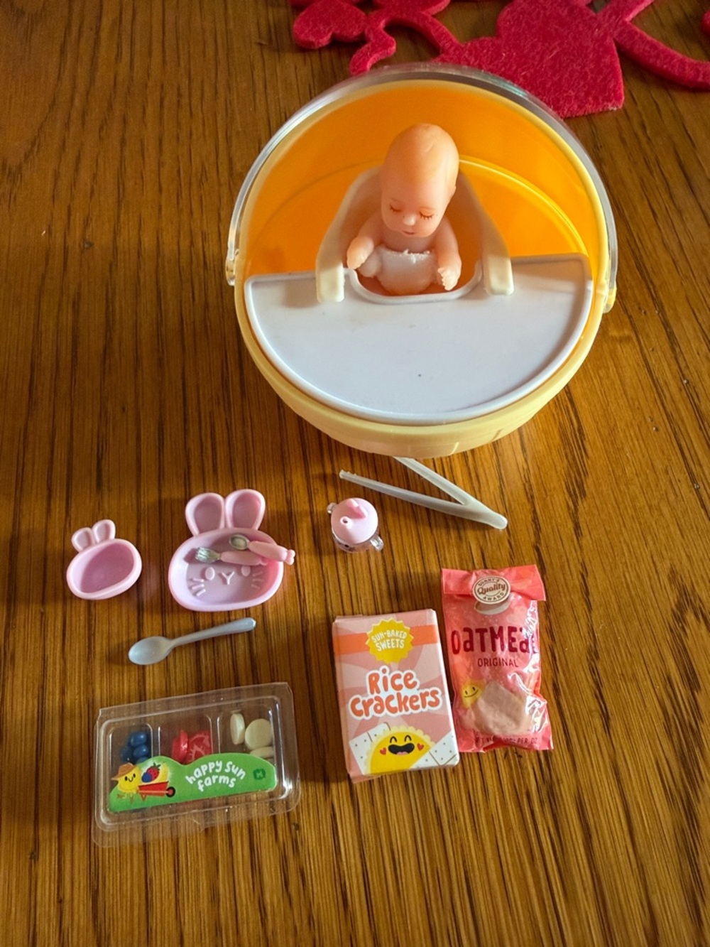 Mini verse baby with food crackers are opened but everything is there.
